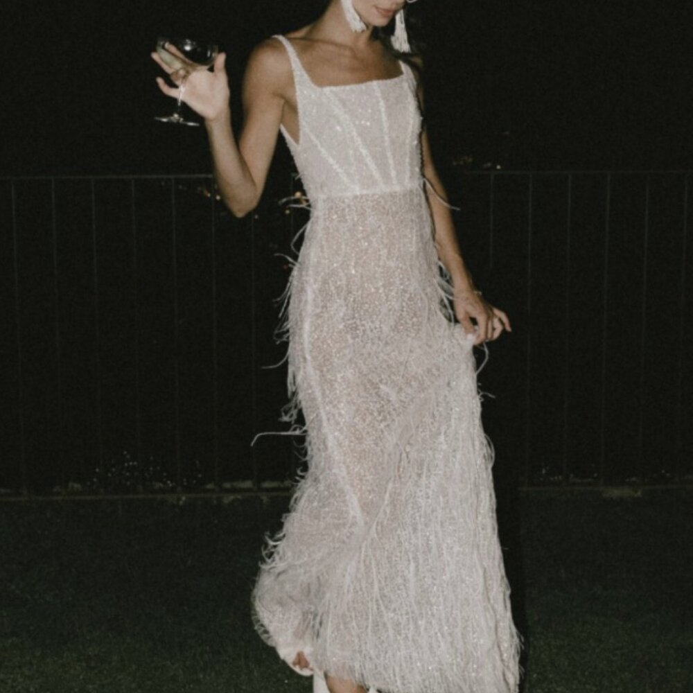 Emma Beaumont - beaded and feather dress